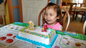 Eliana's third birthday. Later in the day, with ice cream cake.